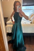 Great material and well crafted! Super fast shipping! and HIDDEN POCKETS! What more could you ask for! This dress makes me feel like a princess and I can't wait to wear it to the wedding! (the color also does look the same as advertised, I just have really bad lighting) - Stephanie Z.