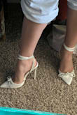 I bought these for my graduation, and they are so pretty! Tying them was a challenge at first, but once I found the way, they feel and fit perfect. There's room in the front of the heel so my toes don't feel tight. If you're not used to wearing super high heels, I would ease into wearing them before any event. - LAURA R.