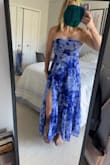 Typically, I'm between a small and a medium. After reading other reviews, I ordered a small. That was a good choice. The back is stretchy so the dress fit well. However, I don't usually order strapless tops because I'm a B and not confident that is enough to hold the top up. That was the issue here. Too much room in the boob area. I thought about adding a strap to help hold it up. Sadly I will return even though I loved the fabric and how it fit everywhere else. As far as length, the bottom of the dress hit my ankle bone - Christine S.