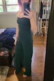 This romper is adorable. I love the colour (exactly what I was expecting with pictures), and the material is thick and double-lined. I'm 5'7 but have oddly long legs so the longer length fits, and it fits my torso okay! If anything the crotch area hung a little low on me which wasn't horrible since I didn't want that area tight anyways. The waist was in a good spot. My only complaint is the huge seam running up the front. Looks a little odd and I feel like it draws the eye...I will probably attempt to add a belt to avoid that. - Christine O.