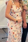 Wore this for my rehearsal and ended up changing into it late into the wedding night! Fits true to size, and I was able to hand wash with no issues after the event! I wore size Large! - Rachael B.