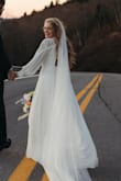 Originally bought this for the rehearsal but once I tried it on, it fit so well that I made it a surprise second dress for my ceremony! It's gorgeous. So classic and modest and fits amazingly! - Rachael B.