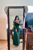 It fits true to size, very comfortable, and extremely flattering! It's also not too long for me (as I'm short) with low chunky heels, it doesn't drag too much, so I'm not even going to hem it! - Laura S.