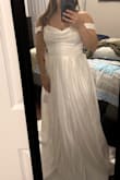 This is such a beautiful dress. It wasn't the right one for me but I still loved it - Doralvy P.