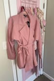 A very stylish & sweet looking coat. I was excitedly waiting for it to be delivered. Unfortunately, the color pink was much more of a dark rose color. I'll most likely return it. - Sylvia M.