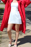 It was a little short and tight, but I love the pearl detail and puffy sleeves. Wore it for my grad photos - Em R.