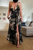 This dress fits amazingly. I did have the slit taken up higher and the chest sewn up a tiny bit. But it fit really nicely and looked super cute and a little sexy. - Amanda N.