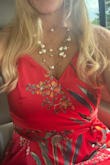 First, let me say this material is amazing. It flows like a ballgown and was not hot during the outdoor July wedding that I attended in Pennsylvania. I ordered both a medium and a large. The medium actually fit to a T perfectly. However, I stuck with the large because of the extra material in the chest area. I needed to be a little more conservative for this particular event. And because of the sash that ties at the waist, you could never tell it was a little large. I ordered it in red and it looked amazing in all the photos. By the way, I am 5 foot 11, wore flat sandals, and it just touches the floor. I had to pick it up to step over thresholds. - Rochelle F.