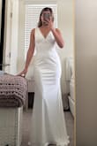 I got this for my engagement shoot, but will be returning both and going with another option. I'm usually a medium, I ordered a S & M because I wasn't sure of my size. This is the S, but I would've preferred it to be more form fitting. You can't really tell in [the] picture, but it's a bit loose on the top (side/back), and I would've had to get it fixed. It's a nice dress, but I think XS would be too small for me. - Elizabeth F.