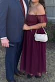 Was looser than I anticipated, yet held up so well, making it so comfy to wear at a formal wedding. The arms are a little tight, like the reviews say, but it wasn't a huge issue. Got so many compliments and loved the color. I have a larger chest and there was plenty of bond to feel supported without being uncomfortable. Will be wearing again and again! - Micalister S.