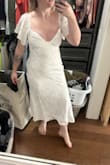This squished my boobs and made them look flat but also put a crease in the middle of them. I loved how it hugged my figure, but could not get past the low cut awkwardness - Abby R.