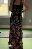 This dress is so beautiful. I bought this for my prom because it fits the theme super well. I love this dress. It is super comfortable! It's slightly heavy, but that was to be expected because of the embroidery. But it wasn't itchy at all. I'm around 5'2 and wore it with 2 1/2" heels; it just BARELY touched the ground. I was super worried it would be too long because I'm somewhat short, but with the right shoes, it's perfect! This dress is absolutely worth it, so well made and pretty! - Ella J.
