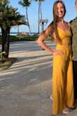 I loved this jumpsuit! I wore it while on vacation on the beach. It's such a fun and unique piece to have. It also made salsa dancing even better with the fun, loose pants. Would buy over and over again! - Arianna D.