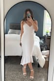 The quality and fit are amazing in this dress! It hugs all your curves, and it's not see through. - Leilani M.