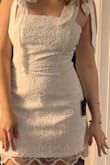 The dress was perfect. The material felt really nice!! - Marie K.
