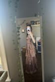 The color of this dress is actually more stunning in real life than on the photos. I love the shimmery fabric! The only thing is I wish there was more support in the cups. Other than that, LOVE! - Laura D.