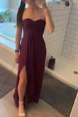 Love the fit of this dress. The color is such a pretty purple-red magenta. Definitely recommend for prom or a formal event. - Ella S.