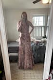 This dress is stunning! It is very flattering and form fitting. - Jessica