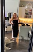 This dress was so easy to wear-once on, it didn't move or shift. The material is stretchy in a good way!  Super classy and striking. - Molly S.