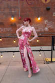 This dress was STUNNINGGGG and is possibly my favorite thing I've ever owned. I bought it for an Oscars party but ended up saving it for my birthday dinner. Even with good sized heels on, it needed hemming, but I decided it was worth it. I felt so confident and pretty all evening and will definitely wear this again. I would caution against anyone who's not confident enough for a super high slit though - it goes all the way up! I only had issues with gusty wind or when I sat down, but once I figured out how to move my skirt better, it was fine. Would definitely buy again!! - Delaney T.