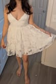 I wanted a short flowy white dress for my bachelorette, this one will do! 
I thought I might need fashion tape to keep covered, but once I tightened the straps quite a bit, it lay against my bust nicer. Although the straps are a bit uncomfortable now. I might try with inserts like boombas to fill it out more. - Alyssa H.