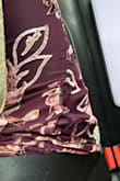 Bought this dress for an event it was perfect when it came in and fit perfectly. I've had it on no more then an hour and there are material is coming undone and I have holes all through the dress. Pretty upset considering I have to wear it all day and this is the only dress I brought. - Nadia G.