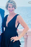 Material is beautiful. I'm 5'5 and did have to have it hemmed... but so worth it. Felt so good in it, comfortable to wear, many compliments. It was for a wedding I was a guest at!! - Susan P.