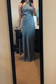 I got a size medium and it fit pretty good. The length was also perfect with heels or with platform shoes. The dress was a bit wrinkly but I was able to easily steam it without ruining the fabric. The front was a little loose when I first tried it on, but the adjustable straps in the back fixed that. - Natalee R.