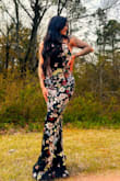 Hugs your curves, plus the stunning floral designs... it's definitely worth every penny! - Jackie L.