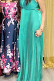 I absolutely loved this dress. The material is super flowy and color is just how it shows on the website. The quality of the fabric and stitching is done very well. It was easy to wear and was able to wash it normally after the use. It is lightweight. I am 5'8 tall and it was perfect for me. I got a lot of compliments. - Dharini P.