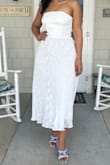 This dress was exactly what I wanted for my bridal shower! I am very much a pear shape, so it's usually difficult for me to find a dress that fits my large hips and small chest without needing alterations. The elastic on the top back helped with that and it fit like a glove! Just wore sticky boobs/covers with it and it was perfect. It was also very comfortable and stayed up well. - Sydney B.