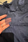 We bought this dress for my daughter for prom. It fit perfectly and was beautiful. Sadly, before she even got to the dance, the top layer of the bodice pulled out of the seams on both sides! it is ruined. So frustrating! Beware, I would not buy this dress! - Natalie T.