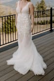 This dress is absolutely stunning! I didn't want to spend thousands on a wedding dress but I didn't want to give up beauty and elegance. This dress checked all of my boxes and then some. I ordered a size small, I'm 5'3 and my measurements are 36-26-36. The bust was forgiving and provided light support but I did end up using inserts for a little more. I also wanted it a little more snug around my hips so I had it taken in. I wore 4" heels and the length was perfect. Overall, this dress is a win. I felt beautiful, my husband loved it and received many compliments from others. I would recommend lulus wedding gowns to anyone looking for a beautiful dress no matter their budget! - Blair B.