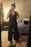 So comfortable, cute, and stylish. Soft fabric. The pockets are convenient but not flattering on the hips (hello, saddlebags). The jumpsuit has a deep V front and back so wear a funky tank underneath if you don't want your bra showing (I paired it with the lulu's black and white striped bodysuit, size m, which I'm also keeping). A little long on me (I'm 5'2") but still wearable. Keeper! - Jessie W.