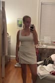 Super cute, stretchy material. Slightly big around the waist area. Supportive! Can be dressed up or down. Plenty of room in the bust area. Double lined. Zipper is a little sticky at the seam, but I just zipped it halfway to put it on, then finish zipping. - Olivia S.