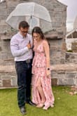 I bought this as a wedding guest at a southern wedding and I loved it! The fit is so flattering, the pattern is gorgeous, and I love the boning structure for support. It is a long dress and I probably should've gotten it hemmed because I was only wearing kitten heels. Either way, I loved it! - Natasha J.