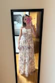 I ordered this for my spring formal and it is beautiful! The colors are pastels and a little less bright than in the photo which I was actually happy with. The top is a bit loose, but overall, I think my normal size S worked out. Perfect length too! Love it!!! - Hannah L.