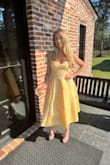 Distress is absolutely stunning. I felt like classy but sexy at the same time. I got so many compliments on the stitching of the pink on top of the yellow. - Katie W.