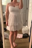 The dress is pretty cute overall, but I agree with the other reviews. It definitely runs small, specifically in the waist. I usually am between a medium and large, but tend to size up anyway because I have a larger bust. The large was still too small (could barely zip it on a good day and completely smushed my chest). I exchanged for an XL, but unfortunately, now it's too big and has a lot of gaping up top. Will probably be returning the XL as well. First photo is the L (only zipped halfway), second photo is the XL. - Jackie C.