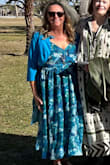 This was for an outside wedding of my niece in St Augustine. I first ordered a large, although it fit, I wanted a bit more in the waist to be totally comfortable all night, so ordered an xl. It was a better fit. I  read all the reviews about the bodice. I loved the look, the floral pattern, I felt so pretty in it. So I chose to iron the bodice closed with some hem tape. This made it perfect. Easy to do and worth it. I received compliments, felt young, and danced the night away. I wore a small sweater as it was a bit chilly, but took it off when I started dancing. Planning on wearing it to my husband's 50th high school reunion too. - Karen N.