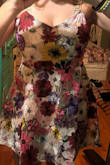 This dress is well made and the flower details are gorgeous. Do not listen to the bad reviews, I almost didn't buy it because a few reviews said that flowers were off center and cheap. This is a high quality well made dress! It does run large. I ordered both medium and large. The large was very loose on my middle, and the medium is loose too, but not enough to size down. Even though both dresses were different sizes the length was the same. So this dress might not work if you are tall. I am 5'4 DD and weigh 148 - Miranda F.