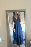 I love this dress and it fits great. I was worried the bust would be unflattering and oversized since I don't have a large chest, but it fit perfectly! However, I ended up returning it because I ordered multiple and like the other one better. - Anna H.