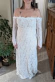 I'm 53 years old and looking for a fairly casual and inexpensive dress for my second wedding that still looks bridal. I loved the neckline and the details on this dress, but it didn't lay smooth in the torso, it buckled and therefore was not flattering. (Even with a strapless bra) I'm not sure if a smaller size would have fixed it, or if I could have had it altered to fit better. It seems like it needs more structure in the torso. Possibly if you had a bustier and attached the dress to it somehow, that might work. I'd encourage you to order it and try it on if you like it. I just think it didn't work for my body shape. - Amy R.