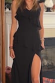 I recently purchased the Black Tight Ruffle Dress from Lulus, and I couldn't be happier! This dress is absolutely stunning, chic, classy, and perfect for any occasion.
The fit is incredibly flattering. It hugs the body in all the right places without feeling too tight, and the material has just the right amount of stretch for comfort. The ruffle detail adds a playful yet sophisticated touch, making it stand out from a simple black dress.
The quality is fantastic as well. The fabric feels high-end, and the stitching is well-done, ensuring durability. Whether for a date night, a cocktail party, or a special event, this dress is a showstopper!
I received so many compliments when I wore it, and I'll definitely be shopping at Lulus again. If you're looking for an effortlessly stylish LBD, this one is a must-have! - Hallie D.