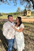 I wore this dress for my elopement. It fit beautifully, and the floral details were perfect and really helped me feel like a bride! I've had several compliments as well. Also, if you are busty, this dress will work for you! My only small critique is the puff sleeves did move up my arms a bit since the elastic grips the arms, but it wasn't uncomfortable or anything, so it wasn't a big deal. - Jordan W.