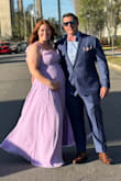 Dress is cute and comfortable. I'm short 5'4 and wish I had the time to have it hemmed. The slit is modest while walking. I have breastfed my firstborn for 14m and definitely needed some bust support. Boob tape could be seen through the material though. I had a lot of cleavage (19yr old me would have been so proud). I wish it were flattering with the straps hanging off the shoulder, but no luck. It's very comfortable for this extremely bloated pregnant mama. There's stretch and room in the dress that I'll likely be able to wear it again down the road with a big bump. - Kristi M.