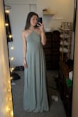 This dress fits perfectly and looks just how I wanted it! It's definitely long, like all the reviews say, but I plan to get it hemmed anyway. I'm usually between an XS and an S, so I was worried the XS would be a little tight, but it's perfect. I was concerned because there were a few frayed pieces of fabric where the thread was coming out of some stitches, so maybe the quality isn't the best? Regardless, I am happy with it - Lisa P.