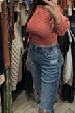 I love this. I ordered medium and I'm glad I did. After the wash, it definitely fit snug and hugs the body. If you're larger chested, size up. I'd love to have all colors. This one is like a coral pink, super cute. It's see through but I don't think it's very noticeable and the back is super cute too. I might even size up to a large. - Amie M.