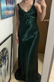 I really love this dress! looks just like the picture! amazing material and so comfortable! runs a tad big but easy to fix at the tailor :) definitely recommend! - Mai G.