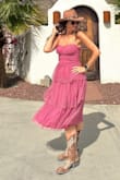 Super cute dress. The color is divine. The tiered layers are so flattering and corset style bra cups are totally sexy. Ordered a size small. Slightly tight in ribs but boobs are perfect. - Cassidy B.